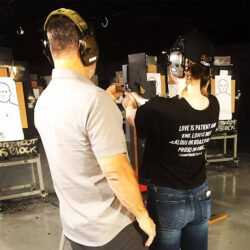Private one-on-one firearms instruction with certified instructor providing individualized handgun training on an indoor range.